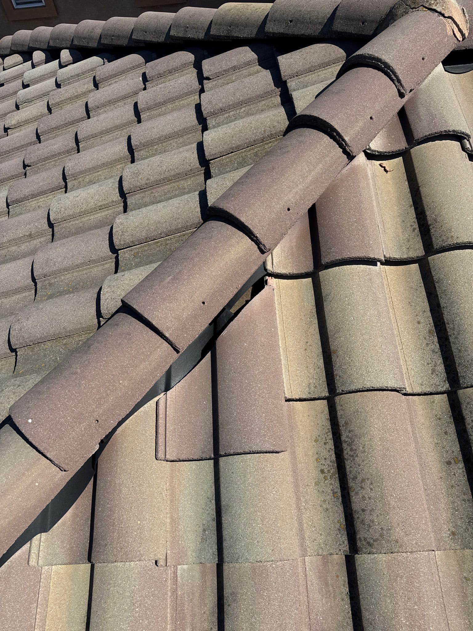 Loose and Cracked Tile Roof Repair Done Right image