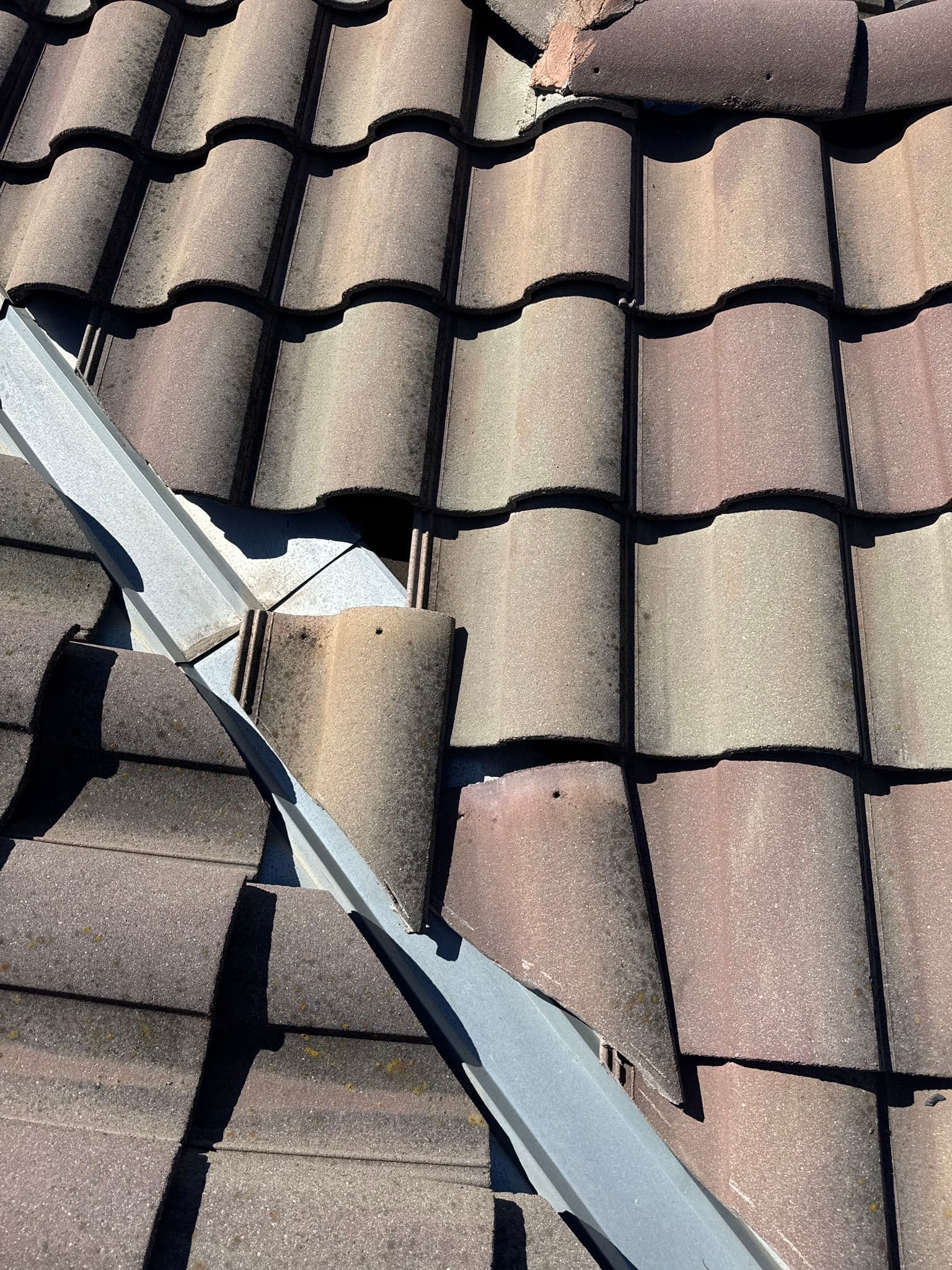 Gallery photos for Loose and Cracked Tile Roof Repair Done Right: Image #2