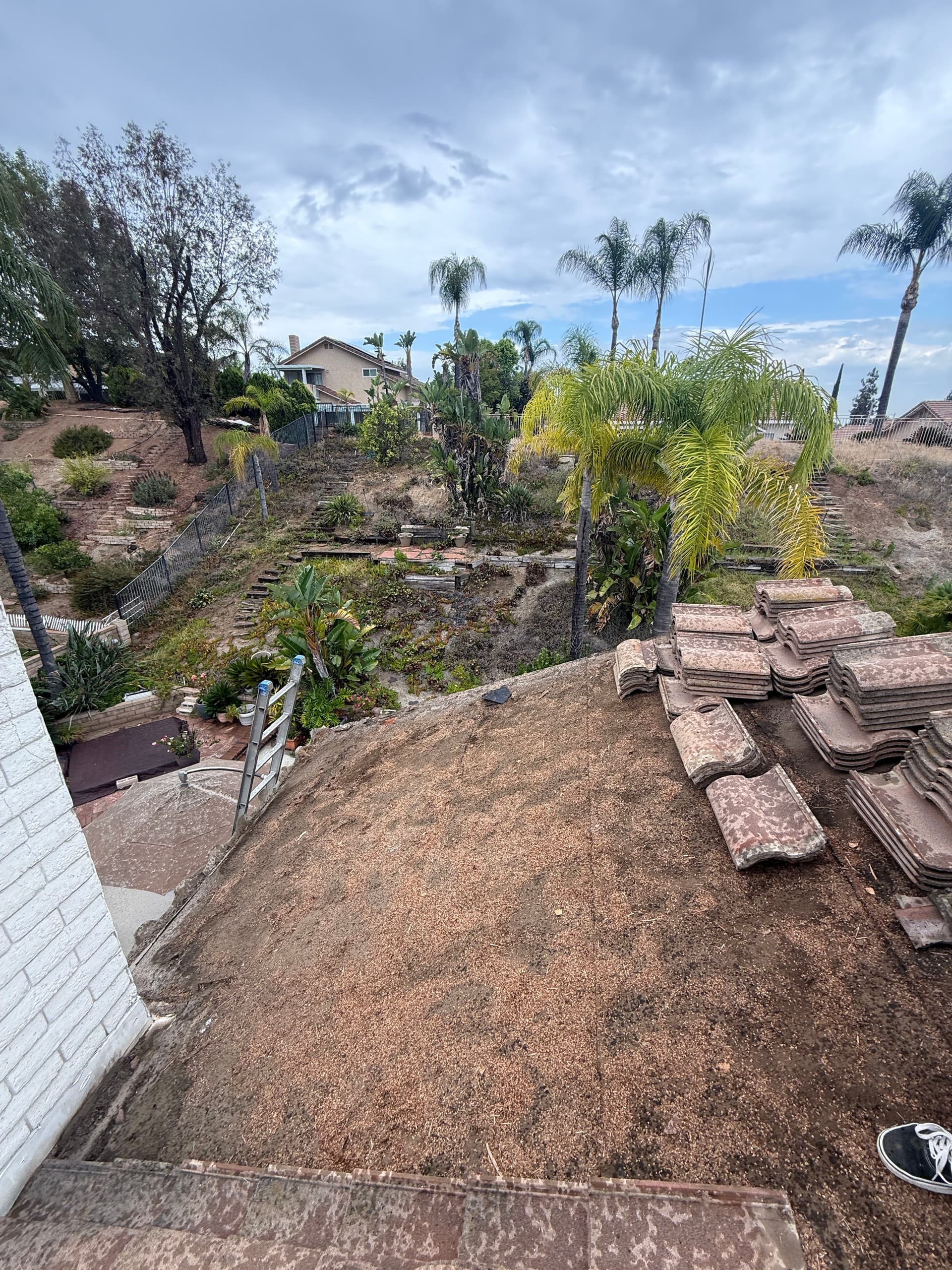 Gallery photos for What Water-Damaged Wood Under a Tile Roof Actually Looks Like: Image #2