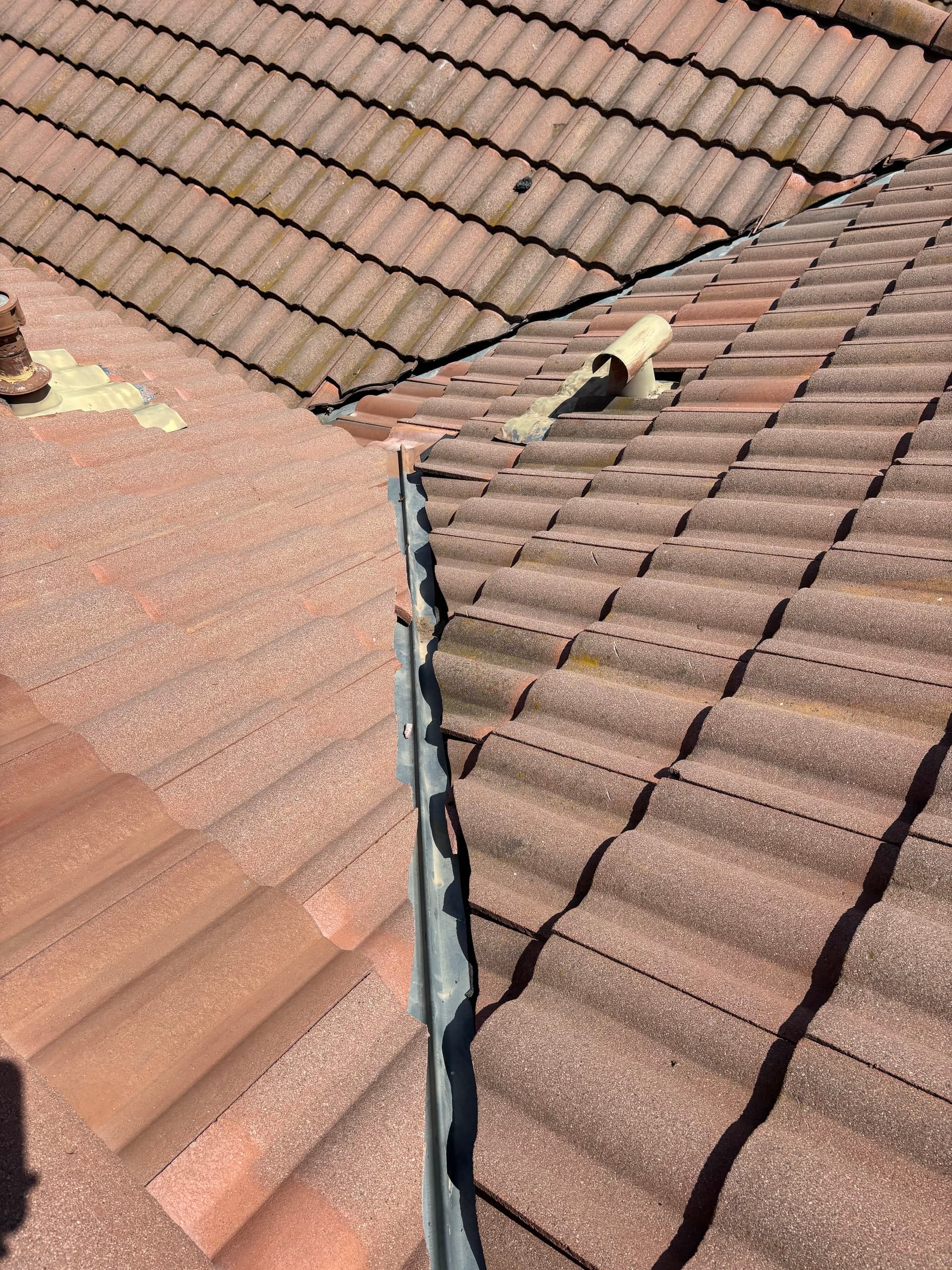 Gallery photos for Debris Buildup in Tile Roof Valleys Is a Leak Waiting to Happen: Image #3